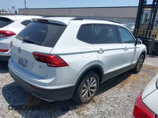 2018 Volkswagen Tiguan S with VIN 3VV1B7AX8JM032990, listed as a IAAI auction lot 42279807 with 74,185 mi miles and . Bid and sale history available at DreamBid. Image 4.