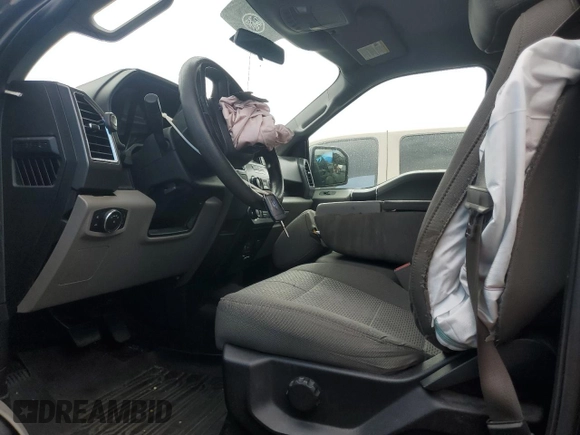 2015 Ford F-150 XL with VIN 1FTEW1CG0FKD03070, listed as a Copart auction lot 52990475 with 102,844 mi miles and Salvage title. Bid and sale history available at DreamBid. Image 7.