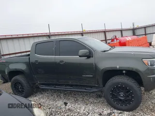 2018 Chevrolet Colorado 4WD LT z VIN 1GCGTCEN2J1235085, wystawiony jako IAAI lot #42192629 z przebiegiem 83 914 mil mil oraz . Historia ofert i sprzedaży dostępna na DreamBid. Obrazek 13.