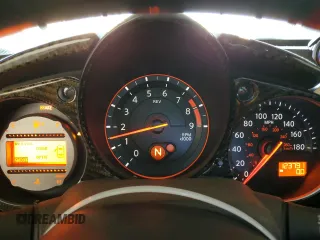 2009 Nissan 370Z z VIN JN1AZ44E19M411715, wystawiony jako Copart lot #56654815 z przebiegiem 123 791 mil mil oraz Szkoda całkowita • Salvage title. Historia ofert i sprzedaży dostępna na DreamBid. Obrazek 9.