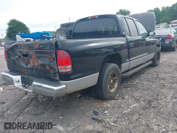 2000 Dodge Dakota Sport with VIN 1B7GL2AX6YS734218, listed as a IAAI auction lot 42272306 with 282,966 mi miles and . Bid and sale history available at DreamBid. Image 4.