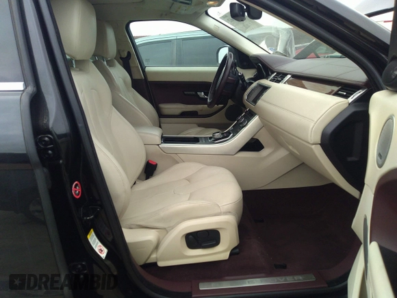 2013 Land Rover Range Rover Evoque Prestige Premium z VIN SALVV2BG3DH709471, wystawiony jako IAAI lot #41506662 z przebiegiem 136 519 mil mil oraz . Historia ofert i sprzedaży dostępna na DreamBid. Obrazek 5.