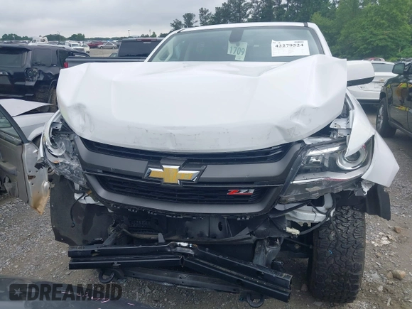 2020 Chevrolet Colorado 4WD Z71 with VIN 1GCGTDEN8L1238033, listed as a IAAI auction lot 42279524 with 22,164 mi miles and . Bid and sale history available at DreamBid. Image 6.