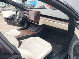 2021 Tesla Model S Plaid with VIN 5YJSA1E69MF439147, listed as a IAAI auction lot 41825656 with 25,626 mi miles. Bid and sale history available at carsss.com. Image 5.