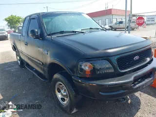 1998 Ford F-150 with VIN 1FTRX18L2WKA67414, listed as a IAAI auction lot 42583873 with 189,546 mi miles and . Bid and sale history available at DreamBid. Image 1.