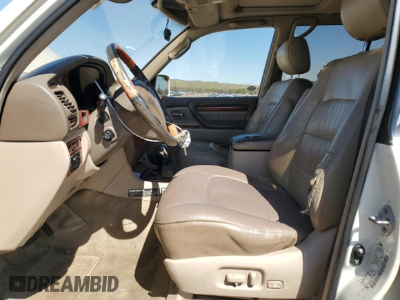 2000 Lexus LX 470 z VIN JT6HT00W1Y0096061, wystawiony jako Copart lot #52499155 z przebiegiem 199 914 mil mil oraz Tytuł czysty. Historia ofert i sprzedaży dostępna na DreamBid. Obrazek 7.