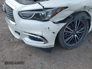 2017 Infiniti QX60 with VIN 5N1DL0MM7HC519011, listed as a IAAI auction lot 41804659 with 118,401 mi miles and . Bid and sale history available at DreamBid. Image 3.