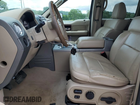 2005 Ford F-150 XLT with VIN 1FTPW14515KE37624, listed as a Copart auction lot 60975915 with 118,976 mi miles and Salvage title. Bid and sale history available at DreamBid. Image 7.