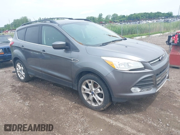 2013 Ford Escape SE with VIN 1FMCU0GX2DUA31362, listed as a IAAI auction lot 42564337 with 157,737 mi miles and . Bid and sale history available at DreamBid. Image 1.