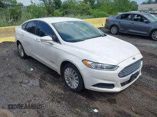 2014 Ford Fusion SE Hybrid with VIN 3FA6P0LU3ER391680, listed as a IAAI auction lot 42643934 with 102,578 mi miles and . Bid and sale history available at DreamBid. Image 1.