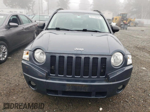 2007 Jeep Compass Sport with VIN 1J8FT470X7D261453, listed as a Copart auction lot 81710234 with 174,118 mi miles and Salvage Title. Bid and sale history available at carsss.com. Image 5.