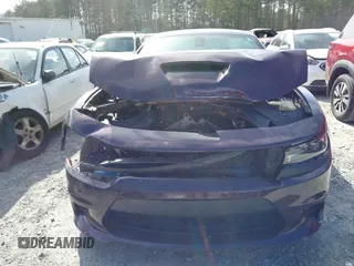 2021 Dodge Charger GT with VIN 2C3CDXHG4MH667025, listed as a IAAI auction lot 41602696 with 77,503 mi miles and . Bid and sale history available at DreamBid. Image 12.