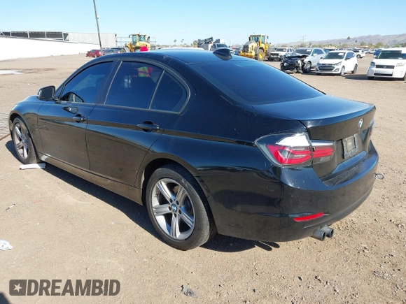 2012 BMW 3 Series 328i with VIN WBA3A5C58CF343636, listed as a IAAI auction lot 41832374 with 136,968 mi miles. Bid and sale history available at carsss.com. Image 3.