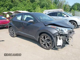 2018 Toyota C-HR XLE z VIN NMTKHMBXXJR037735, wystawiony jako IAAI lot #42419204 z przebiegiem 208 337 mil mil oraz . Historia ofert i sprzedaży dostępna na DreamBid. Obrazek 1.