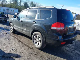 2009 Kia Borrego EX with VIN KNDJJ742X95034968, listed as a IAAI auction lot 41411206 with 146,584 mi miles. Bid and sale history available at carsss.com. Image 3.