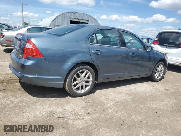 2012 Ford Fusion SEL z VIN 3FAHP0JG7CR297174, wystawiony jako Copart lot #55469005 z przebiegiem 129 434 mil mil oraz Szkoda całkowita • Salvage title. Historia ofert i sprzedaży dostępna na DreamBid. Obrazek 3.