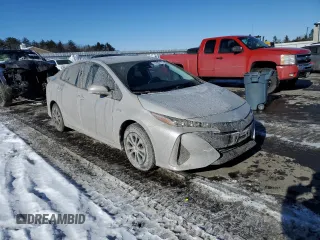 2021 Toyota Prius LE with VIN JTDKAMFP5M3193929, listed as a Copart auction lot 42902175 with 27,933 mi miles and Salvage Title. Bid and sale history available at DreamBid. Image 4.