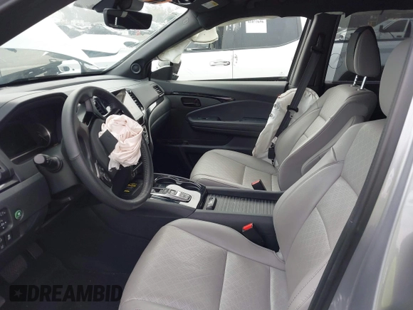 2023 Honda Passport Elite with VIN 5FNYF8H02PB029127, listed as a IAAI auction lot 41166484 with 16,200 mi miles and . Bid and sale history available at DreamBid. Image 5.