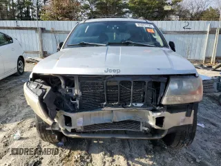 2004 Jeep Grand Cherokee Laredo z VIN 1J4GW48S84C200617, wystawiony jako Copart lot #51732045 z przebiegiem 171 452 mil mil oraz Nie do naprawy • Non repairable. Historia ofert i sprzedaży dostępna na DreamBid. Obrazek 5.