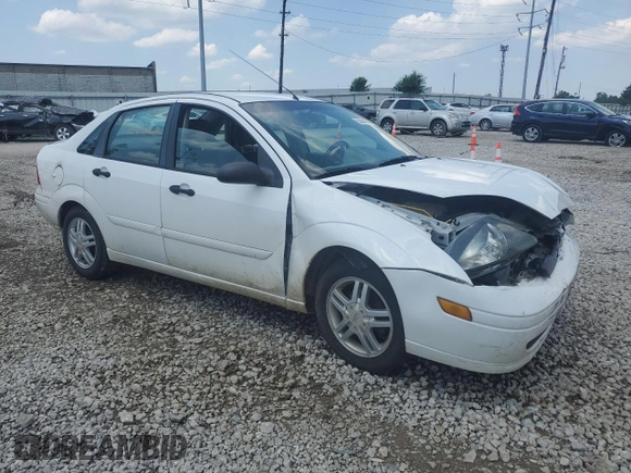 2003 Ford Focus SE with VIN 1FAFP34353W231334, listed as a Copart auction lot 63844205 with 86,601 mi miles and Salvage title. Bid and sale history available at DreamBid. Image 4.