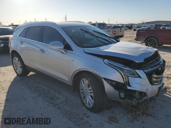 2017 Cadillac XT5 Premium Luxury FWD with VIN 1GYKNCRS2HZ226414, listed as a Copart auction lot 47858955 with 168,442 mi miles and Salvage Title. Bid and sale history available at DreamBid. Image 4.