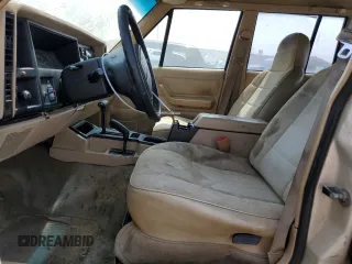 1996 Jeep Cherokee Sport with VIN 1J4FJ68S4TL146513, listed as a Copart auction lot 71039984 with 330,765 mi miles and Clean Title. Bid and sale history available at carsss.com. Image 7.