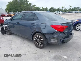 2018 Toyota Corolla L with VIN 5YFBURHE1JP814781, listed as a IAAI auction lot 42408378 with 115,543 mi miles and . Bid and sale history available at DreamBid. Image 3.