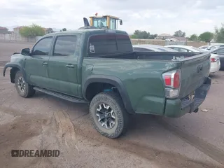 2021 Toyota Tacoma SR z VIN 3TYCZ5AN2MT049069, wystawiony jako IAAI lot #42116964 z przebiegiem 96 275 mil mil oraz . Historia ofert i sprzedaży dostępna na DreamBid. Obrazek 3.