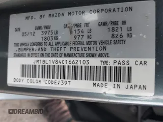 2012 Mazda Mazda3 i Touring with VIN JM1BL1V84C1662103, listed as a IAAI auction lot 41839142 with 153,158 mi miles. Bid and sale history available at carsss.com. Image 9.