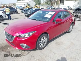 2015 Mazda 3 i Touring with VIN JM1BM1L75F1262109, listed as a IAAI auction lot 42232811 with 53,744 mi miles and . Bid and sale history available at DreamBid. Image 2.
