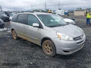 2004 Toyota Sienna XLE with VIN 5TDZA22C14S076563, listed as a IAAI auction lot 41980606 with 195,007 mi miles. Bid and sale history available at carsss.com. Image 1.