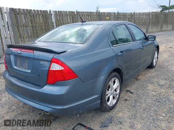 2012 Ford Fusion SE with VIN 3FAHP0HA5CR264255, listed as a IAAI auction lot 42649304 with 127,463 mi miles and . Bid and sale history available at DreamBid. Image 4.