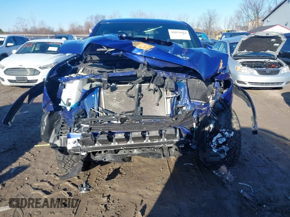 2023 Toyota Tacoma 4WD SR with VIN 3TMCZ5AN9PM559919, listed as a IAAI auction lot 41855044 with 46,153 mi miles. Bid and sale history available at carsss.com. Image 13.
