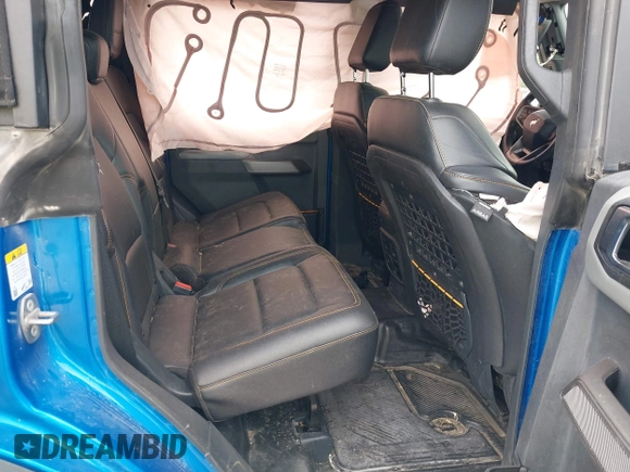 2021 Ford Bronco z VIN 1FMEE5DHXMLA78970, wystawiony jako IAAI lot #42316756 z przebiegiem 35 668 mil mil oraz . Historia ofert i sprzedaży dostępna na DreamBid. Obrazek 8.
