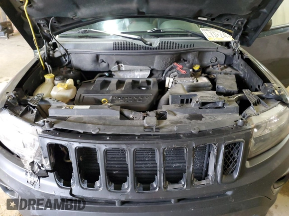 2016 Jeep Compass Sport with VIN 1C4NJDBBXGD598240, listed as a Copart auction lot 57887495 with 152,932 mi miles and Salvage title. Bid and sale history available at DreamBid. Image 12.