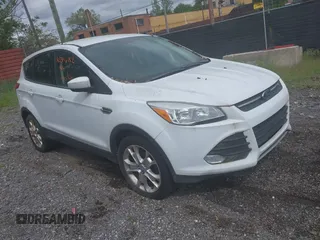 2014 Ford Escape SE z VIN 1FMCU0GX1EUB57195, wystawiony jako IAAI lot #42346152 z przebiegiem 158 784 mil mil oraz . Historia ofert i sprzedaży dostępna na DreamBid. Obrazek 1.