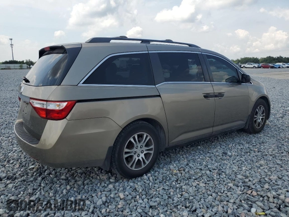 2012 Honda Odyssey LX with VIN 5FNRL5H25CB109643, listed as a Copart auction lot 55951805 with 128,341 mi miles and Clean Title. Bid and sale history available at carsss.com. Image 3.