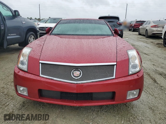 2005 Cadillac XLR z VIN 1G6YV34AX55600837, wystawiony jako Copart lot #75055604 z przebiegiem Nie podano mil oraz Szkoda całkowita • Salvage title. Historia ofert i sprzedaży dostępna na DreamBid. Obrazek 5.