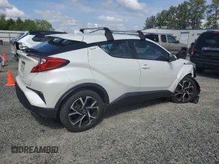 2018 Toyota C-HR XLE with VIN NMTKHMBX9JR060424, listed as a Copart auction lot 57913775 with 104,847 mi miles and Salvage title. Bid and sale history available at DreamBid. Image 3.