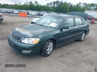 2001 Toyota Avalon XL z VIN 4T1BF28B11U168387, wystawiony jako IAAI lot #42186182 z przebiegiem 129 935 mil mil oraz . Historia ofert i sprzedaży dostępna na DreamBid. Obrazek 2.