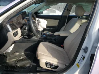 2018 BMW 3 Series 320i with VIN WBA8A9C55JAH12818, listed as a Copart auction lot 52110515 with 72,522 mi miles and Salvage title. Bid and sale history available at DreamBid. Image 7.