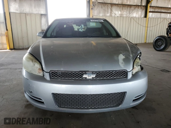 2014 Chevrolet Impala LT with VIN 2G1WB5E3XE1103306, listed as a Copart auction lot 63231005 with 163,901 mi miles and Salvage title. Bid and sale history available at DreamBid. Image 5.