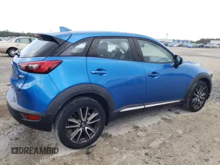 2016 Mazda CX-3 Grand Touring with VIN JM1DKBD72G0106104, listed as a Copart auction lot 52581085 with 76,603 mi miles and Salvage Title. Bid and sale history available at carsss.com. Image 3.