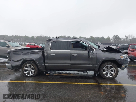 2021 Ram 1500 Limited with VIN 1C6SRFHT4MN588369, listed as a IAAI auction lot 41553981 with 51,293 mi miles and . Bid and sale history available at DreamBid. Image 13.