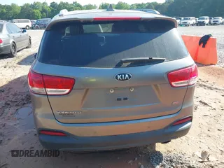 2017 Kia Sorento LX with VIN 5XYPG4A32HG294131, listed as a IAAI auction lot 42079685 with 106,166 mi miles. Bid and sale history available at carsss.com. Image 16.