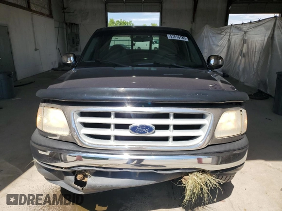 1999 Ford F-150 XL z VIN 1FTRX17L5XNB13867, wystawiony jako Copart lot #57616185 z przebiegiem Nie podano mil oraz Nie do naprawy • Non repairable. Historia ofert i sprzedaży dostępna na DreamBid. Obrazek 5.