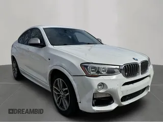 2018 BMW X4 M40i with VIN 5UXXW7C53J0W65097, listed as a Copart auction lot 48798635 with 133,367 mi miles and Clean Title. Bid and sale history available at carsss.com. Image 1.