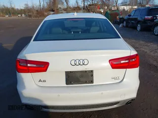 2015 Audi A6 Premium Plus z VIN WAUFGAFC9FN007079, wystawiony jako IAAI lot #41496754 z przebiegiem 69 357 mil mil oraz . Historia ofert i sprzedaży dostępna na DreamBid. Obrazek 16.