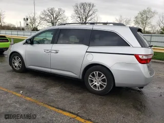 2011 Honda Odyssey EX-L with VIN 5FNRL5H62BB098148, listed as a Copart auction lot 50971955 with 257,103 mi miles and Salvage Title. Bid and sale history available at carsss.com. Image 2.