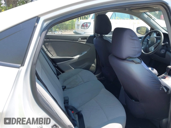 2014 Hyundai Accent GLS z VIN KMHCT4AE1EU637366, wystawiony jako IAAI lot #42455436 z przebiegiem 121 764 mil mil oraz . Historia ofert i sprzedaży dostępna na DreamBid. Obrazek 8.